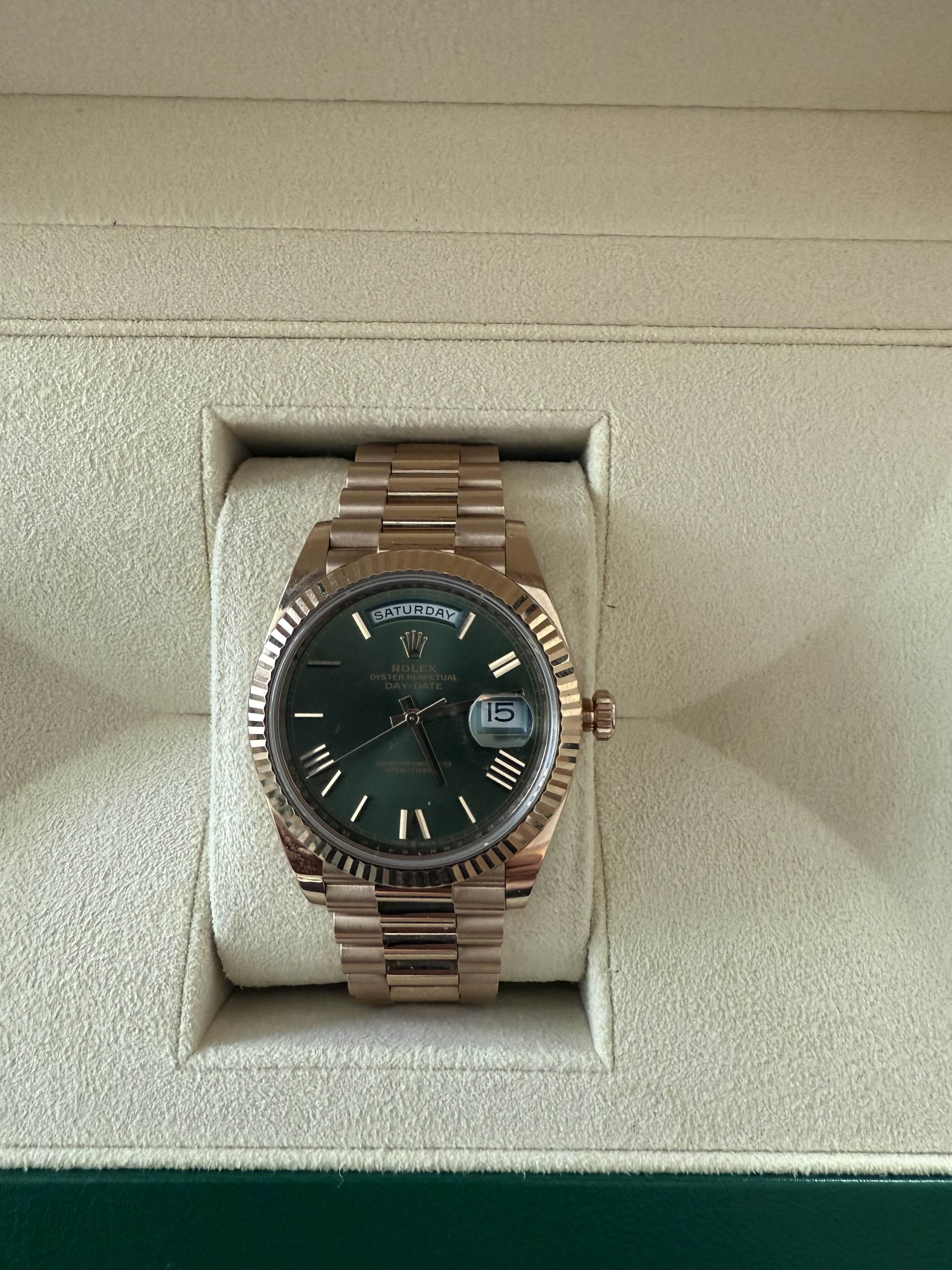 Rolex Day-Date 40 Presidential | 18k Rose Gold 228235 | Olive Green Roman Dial | Fluted Bezel
